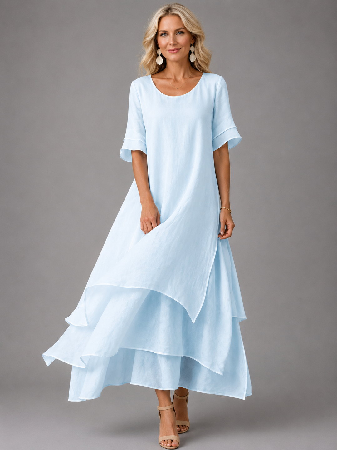 Light blue maxi dress with short sleeves and layered ruffle hem