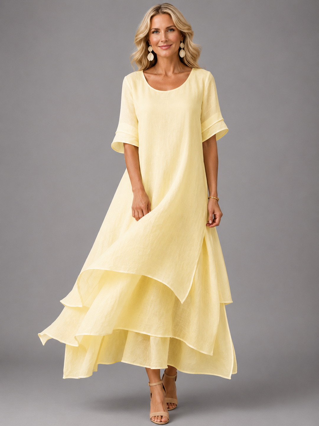Yellow maxi dress with short sleeves and tiered ruffle skirt