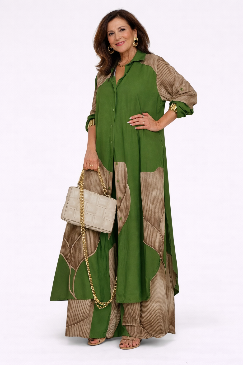 Green flowing two-piece set with long draped jacket and wide-leg pants, beige accents