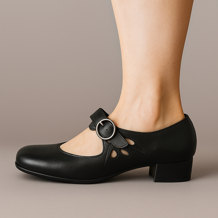 Black leather low-heel Mary Jane shoes with round buckle strap and cutout
