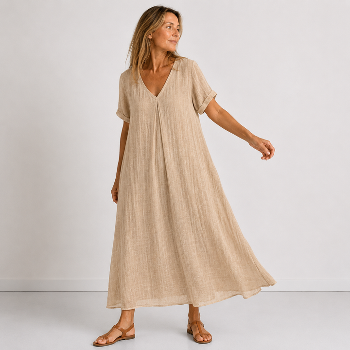 Beige linen V-neck midi dress with short sleeves, button front, and airy skirt