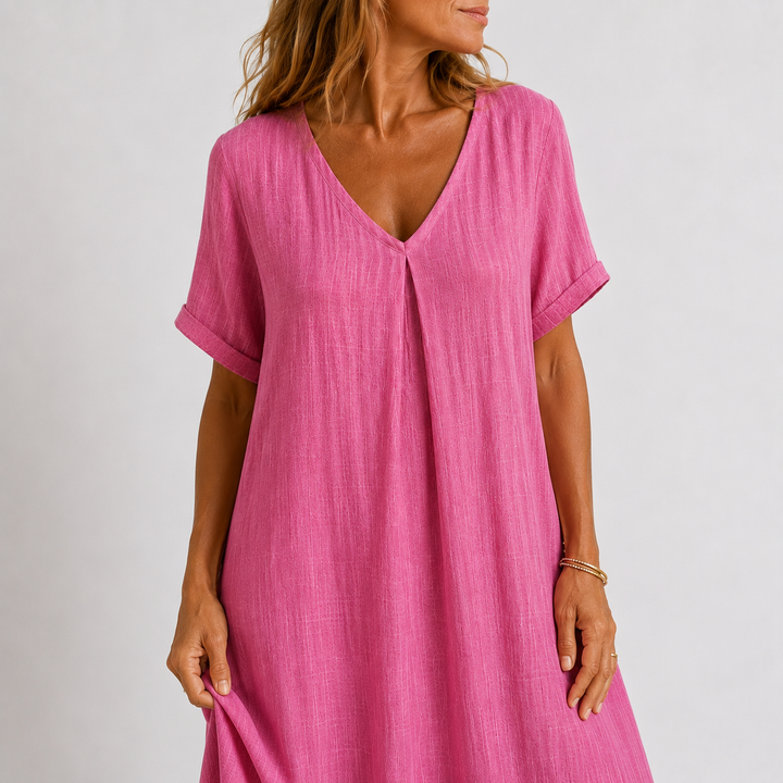 Pink linen V-neck dress, short sleeves and front seam detail, relaxed fit