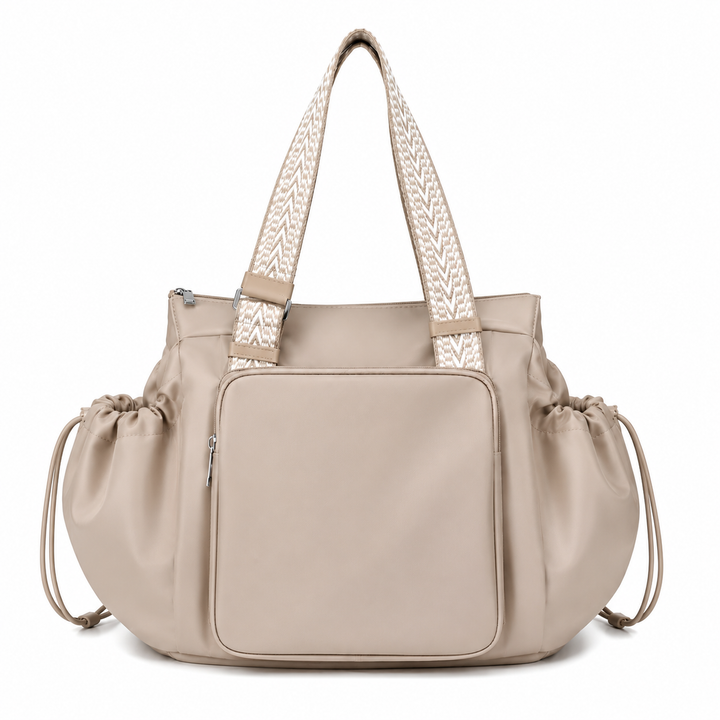Light beige 3-in-1 organized tote bag with front pocket, ruffled sides, and patterned shoulder straps