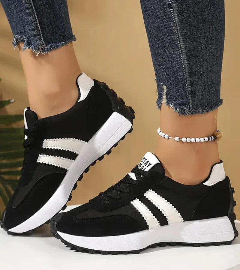 Women’s retro lace-up sneakers, black with white stripes and thick tread sole