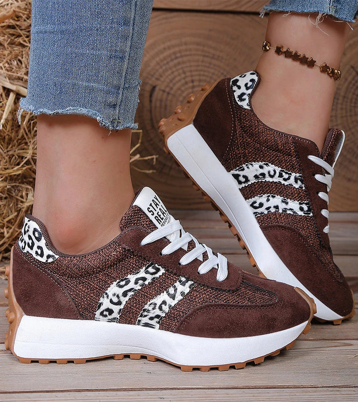 Dark brown retro lace-up sneakers with leopard print panels and white soles