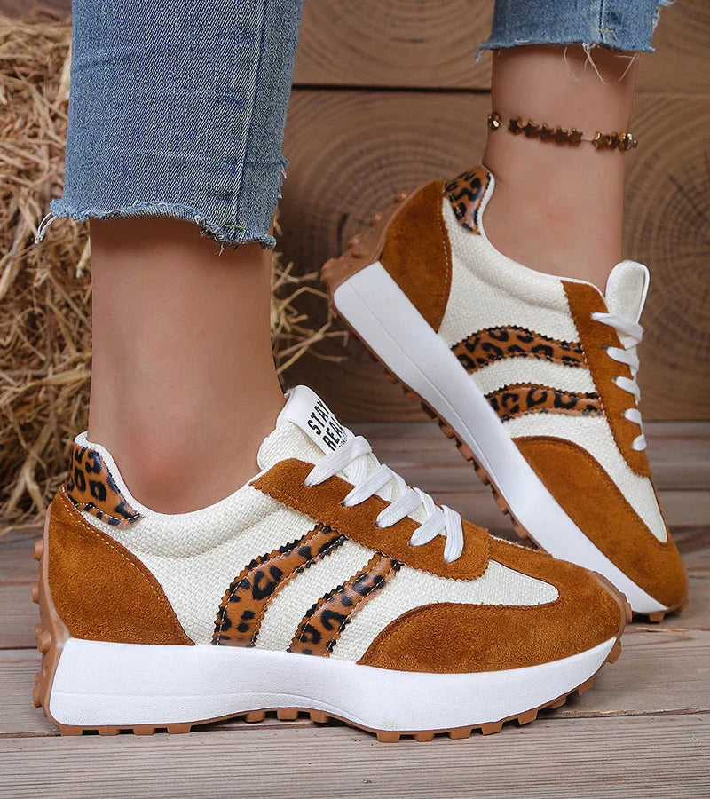 Brown suede lace-up sneakers with leopard-print stripes and white rubber sole