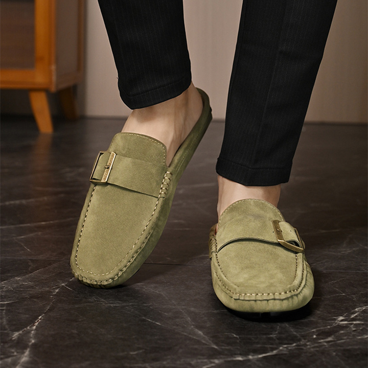 Olive suede loafers pair, front view with square metal buckle detail