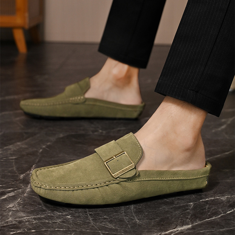 Olive suede loafers close side angle, moc-style stitching and buckle strap
