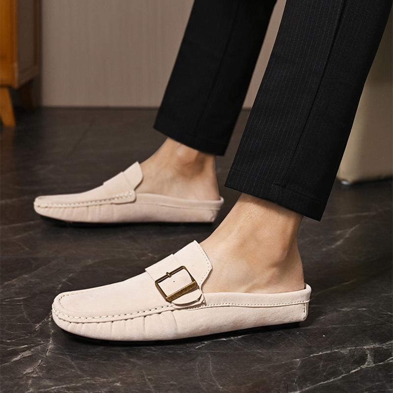 Light cream suede loafers with buckle strap and stitched moc toe seam