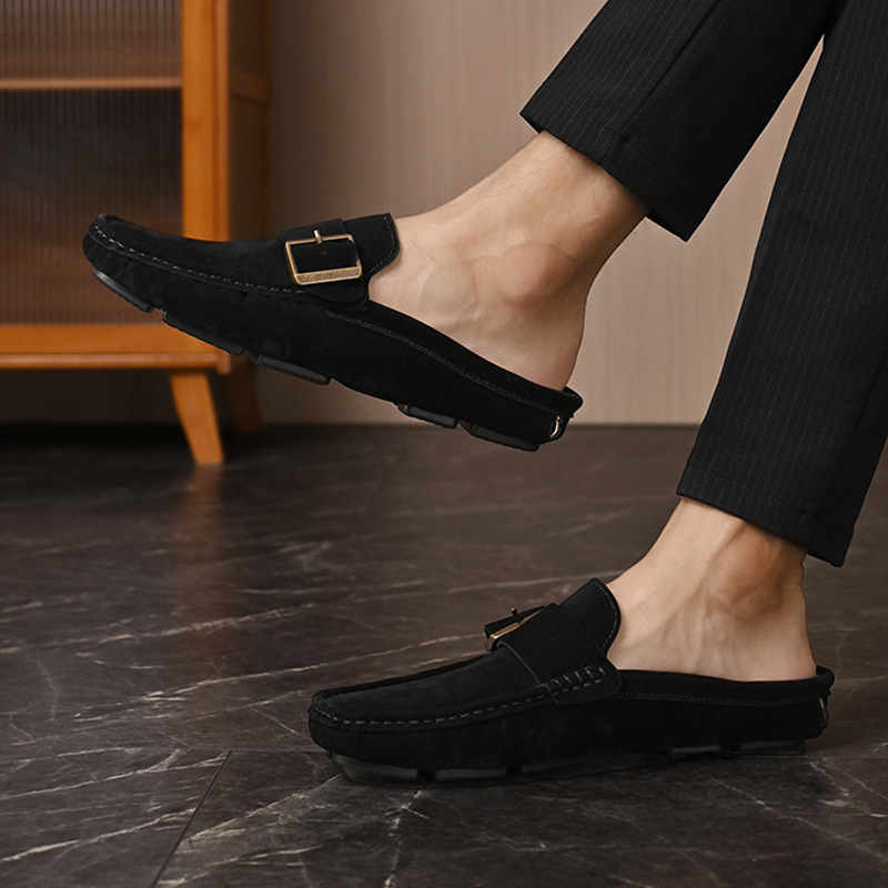 Black suede loafers slip-on with gold buckle strap and stitched outsole