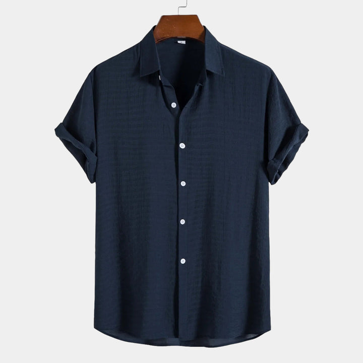 Navy short-sleeve summer shirt with pointed collar and button-front placket