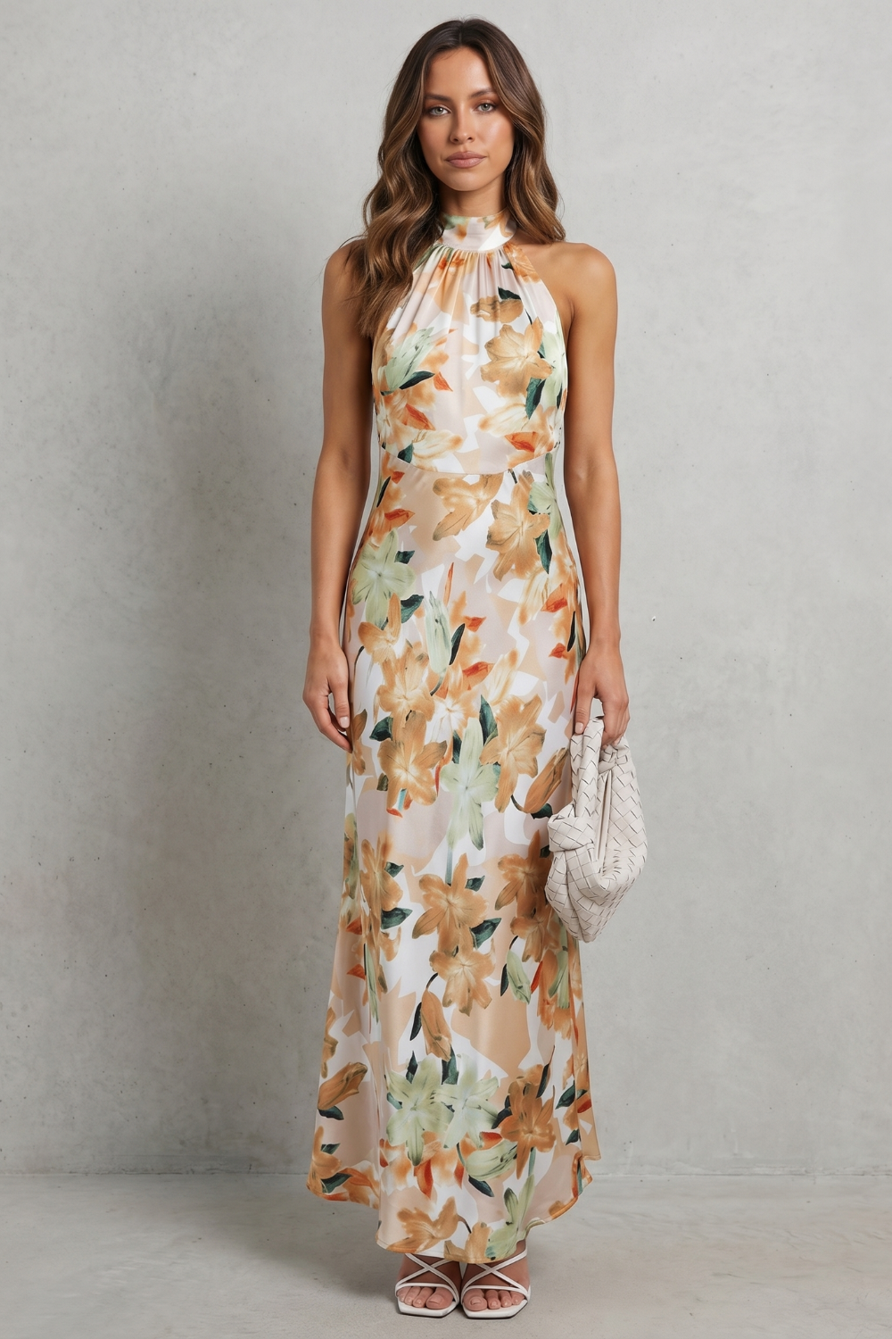 Floral halter maxi dress, sleeveless, champagne base with green and warm floral print