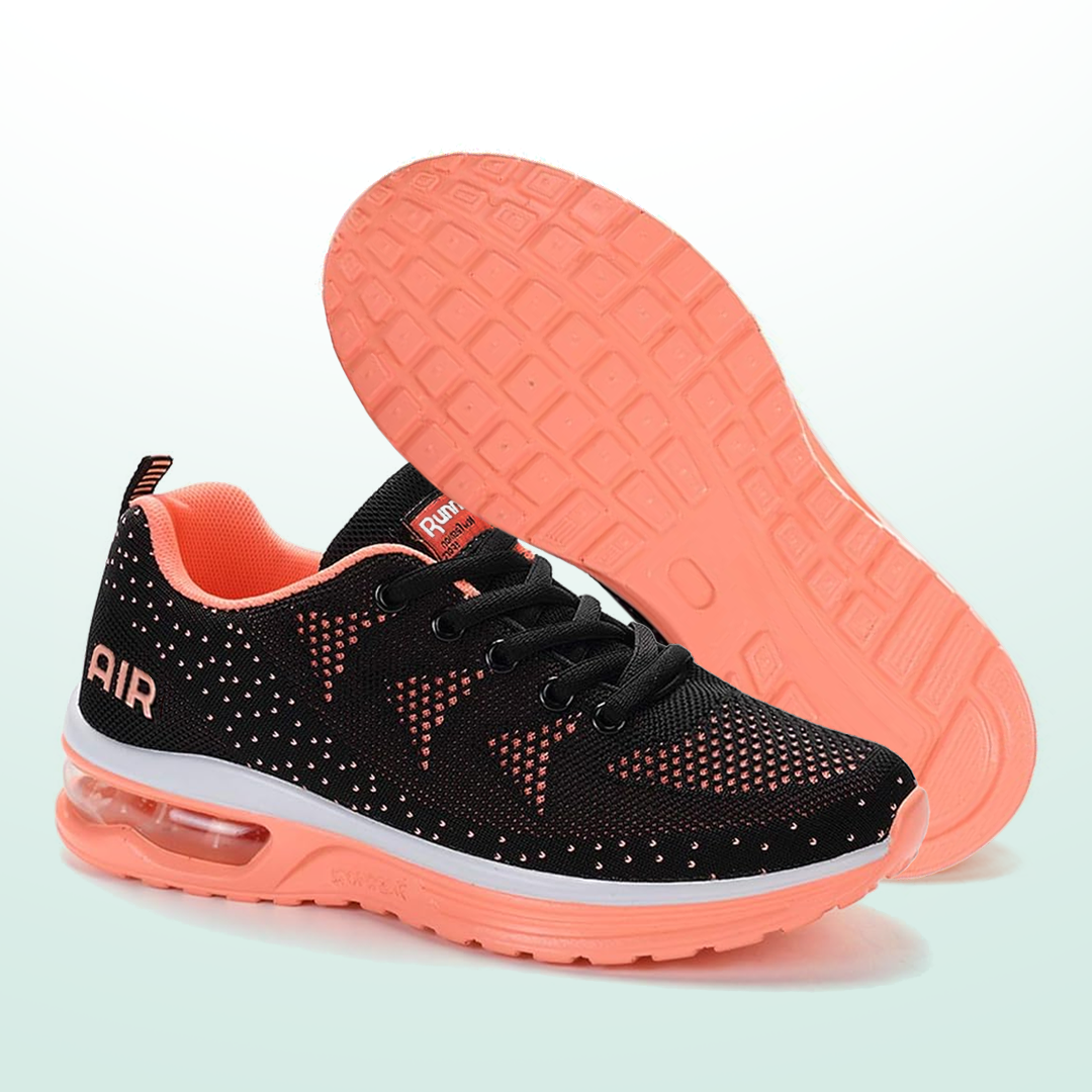 Black lace-up sneakers with orange outsole, speckled knit, and air-cushion midsole
