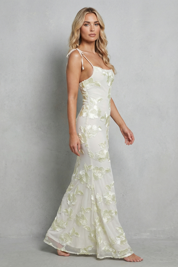Ivory floral bodycon maxi dress with spaghetti straps and flared hem