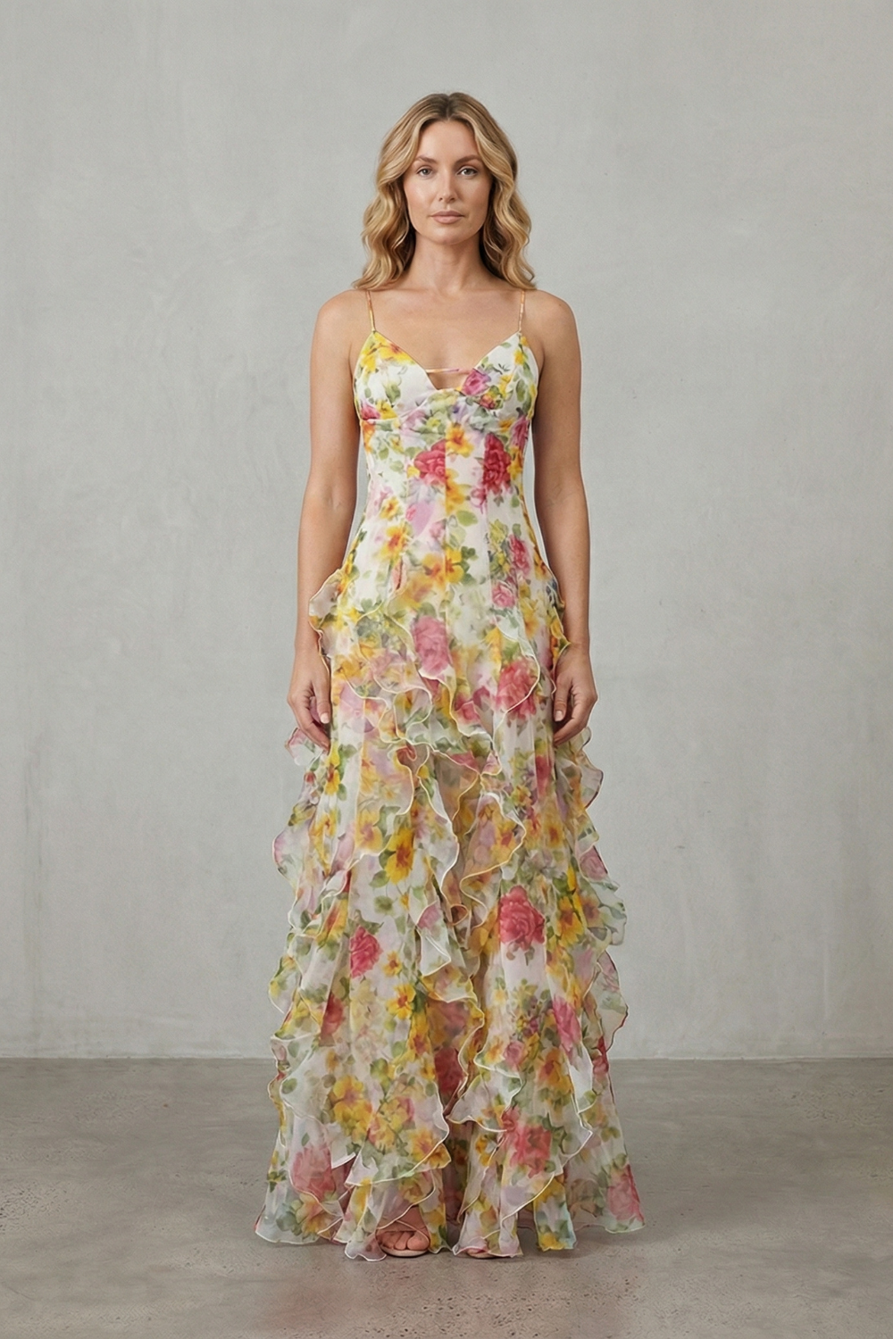 Light yellow floral chiffon maxi dress with ruffled tiers and thin spaghetti straps