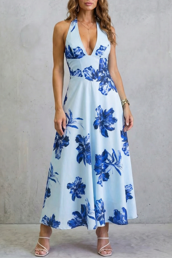 Blue floral maxi dress with deep V neckline and thin straps