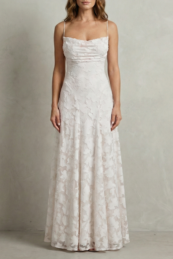White floral embossed sleeveless maxi dress with ruched bodice and flowing skirt