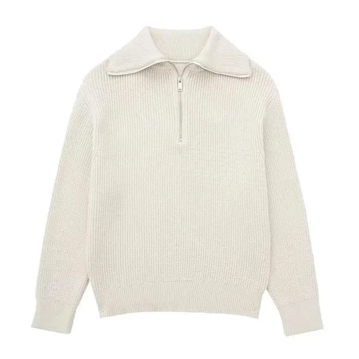 Cream knit quarter-zip sweater with ribbed stand collar and short zipper