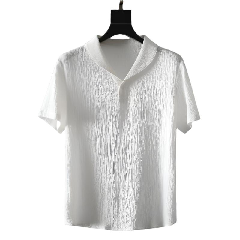 White cotton polo shirt with short sleeves and buttoned collar.