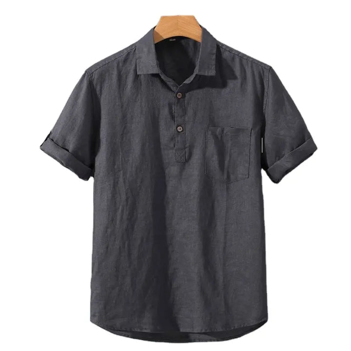 Dark gray linen polo shirt with short sleeves, button placket, and chest pocket