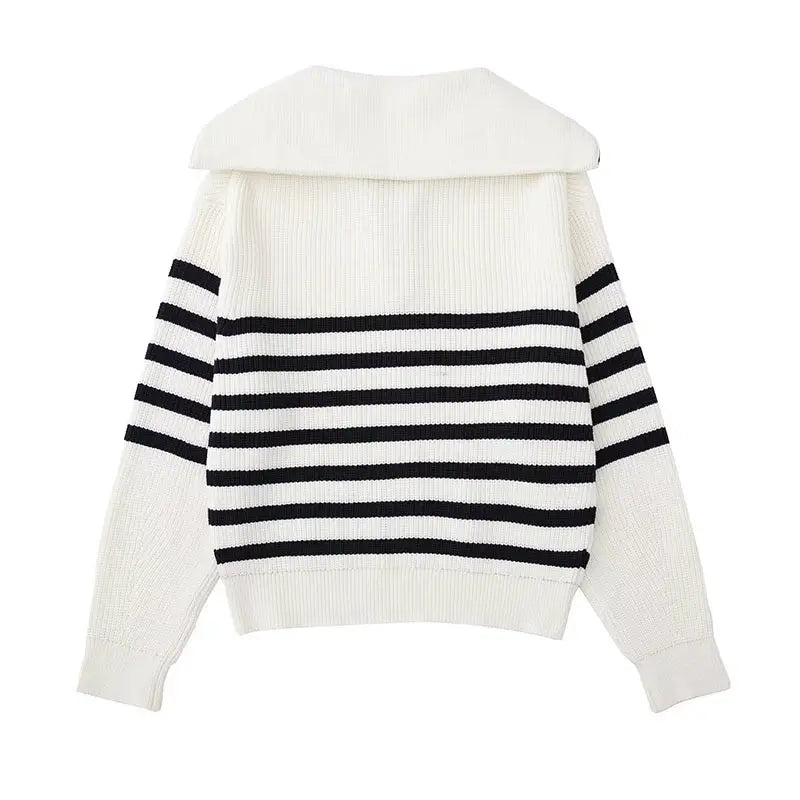 White knit zip sweater back view with navy-and-white horizontal stripe panel