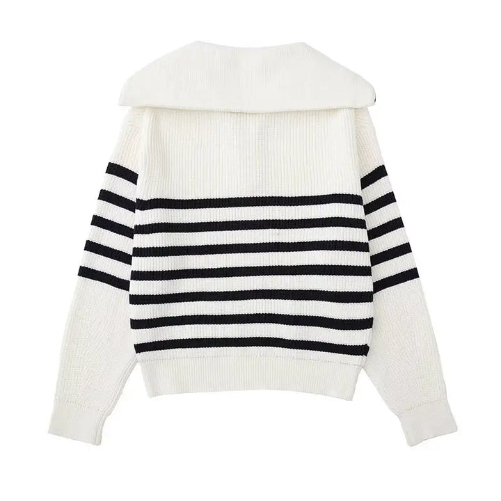 White knit zip sweater back view with navy-and-white horizontal stripe panel