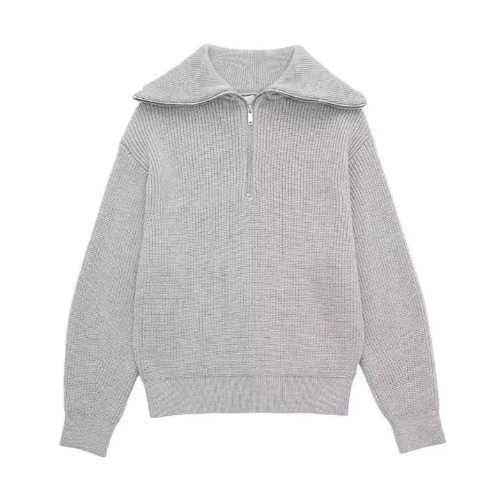 Gray knit quarter-zip sweater with ribbed stand collar and half zipper
