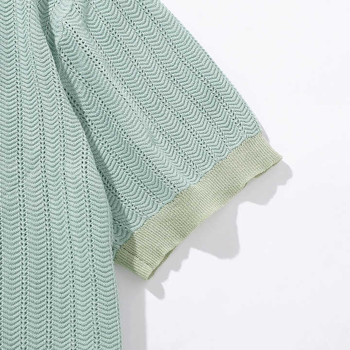 Mint knit polo sleeve with textured stitch pattern and ribbed cuff