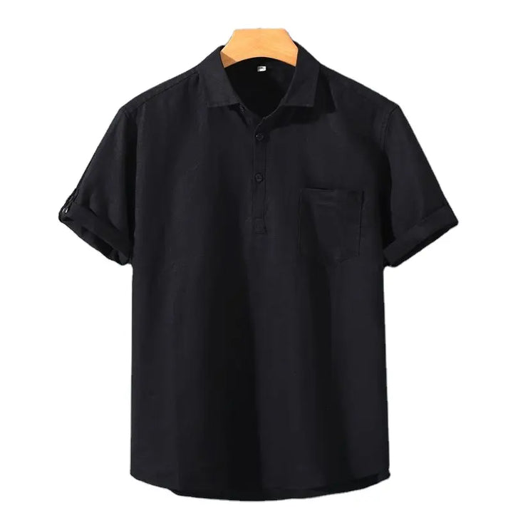 Black linen polo shirt with short sleeves, button placket, and chest pocket