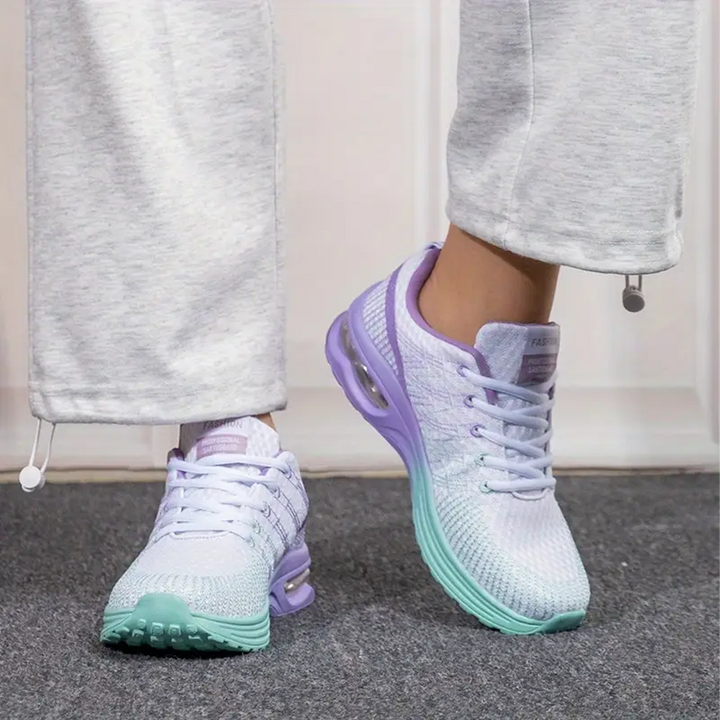 Women’s air cushion walking sneakers close-up: lavender knit, teal air-cushioned sole