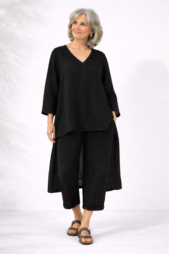 Black two-piece set with V-neck layered top and wide-leg pants