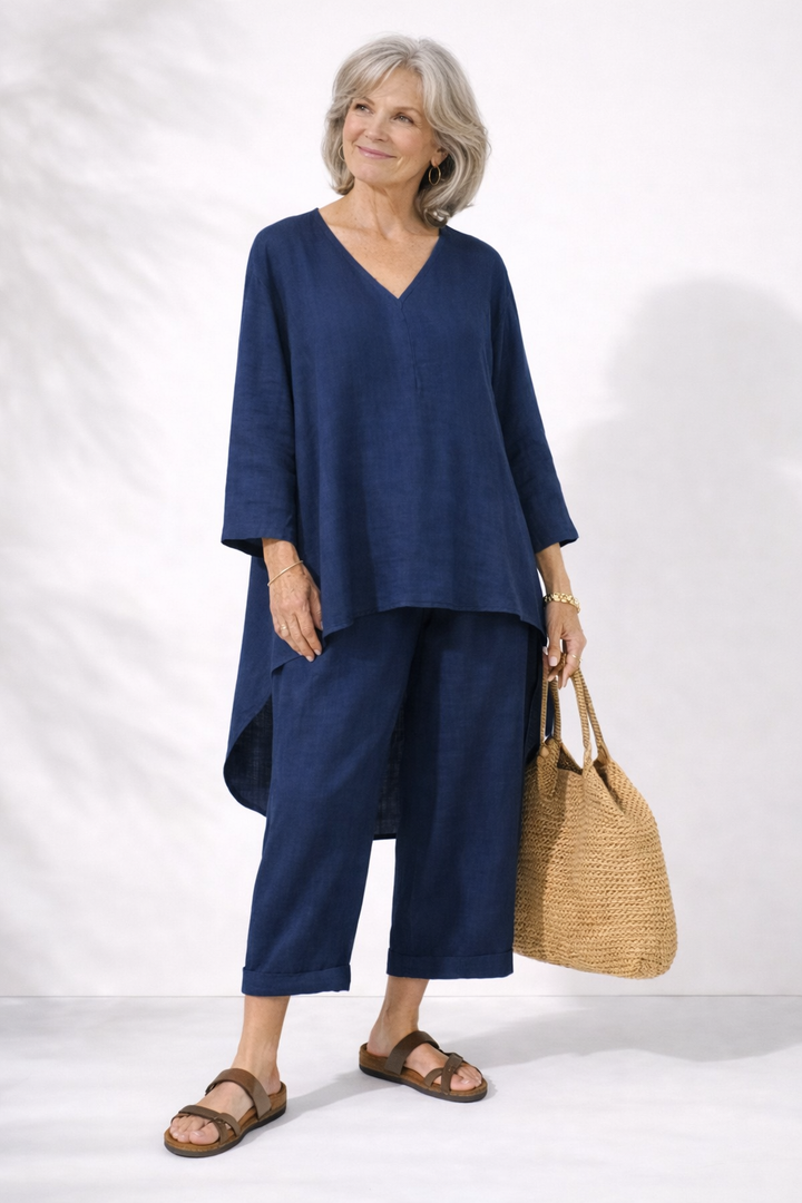 Navy two-piece set with V-neck layered top and wide-leg pants