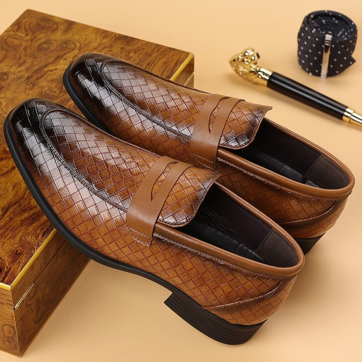 Brown woven slip-on business shoes with cross strap detail and dark rubber soles