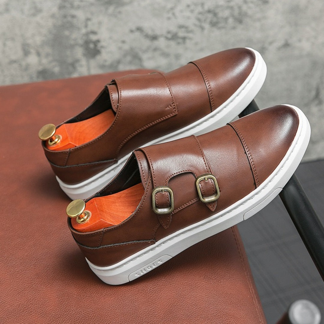Brown strap sneakers with double buckle details and white rubber sole