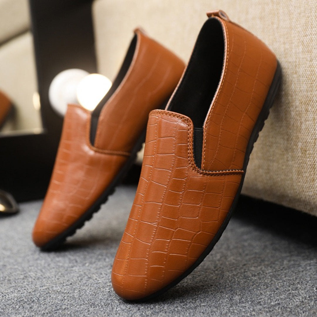 Brown croc-textured slip-on loafers with elastic gore side panels