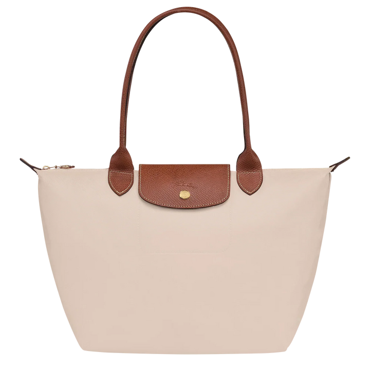 Longchamp Medium Le Pliage tote in paper canvas with brown leather handles and snap pocket