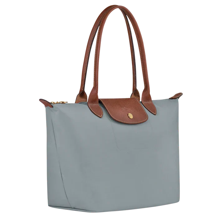 Longchamp medium Le Pliage tote, steel blue with tan leather handles and side view