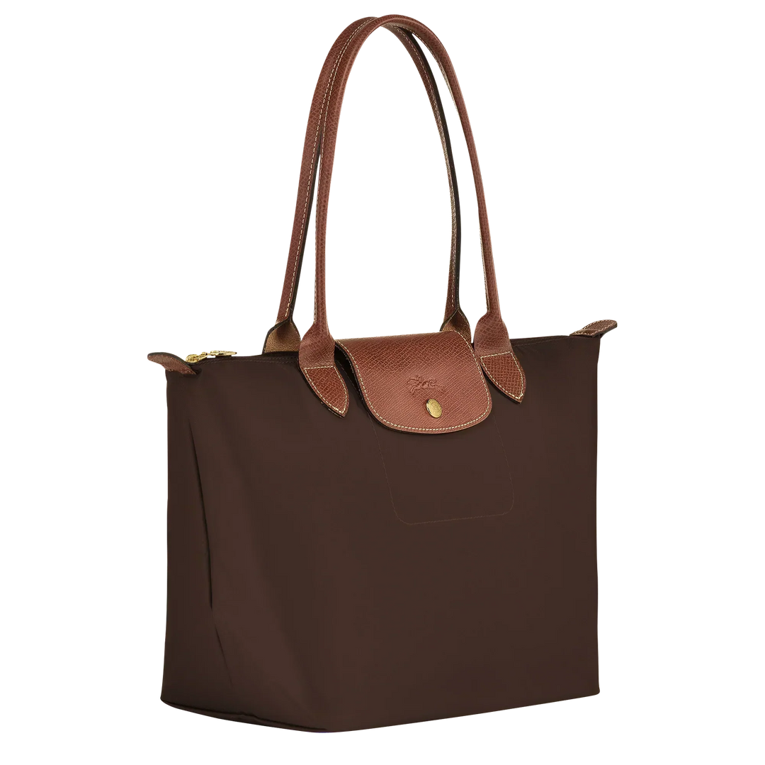 Longchamp medium Le Pliage tote in dark fabric with tan leather trim and gold button