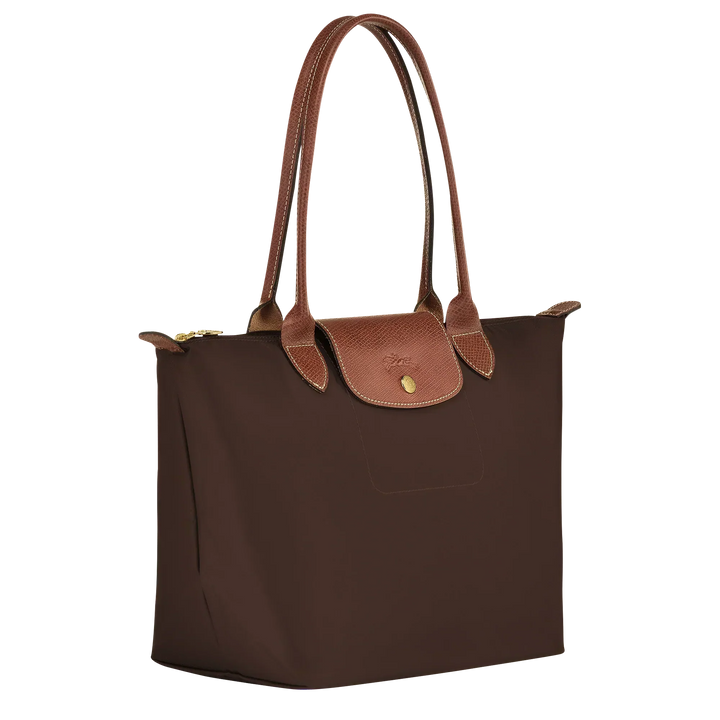 Longchamp medium Le Pliage tote in dark fabric with tan leather trim and gold button