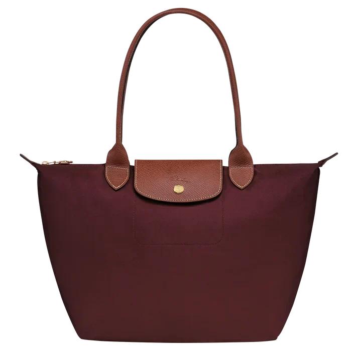 Medium tote bag by Longchamp in burgundy with top handles and front pocket