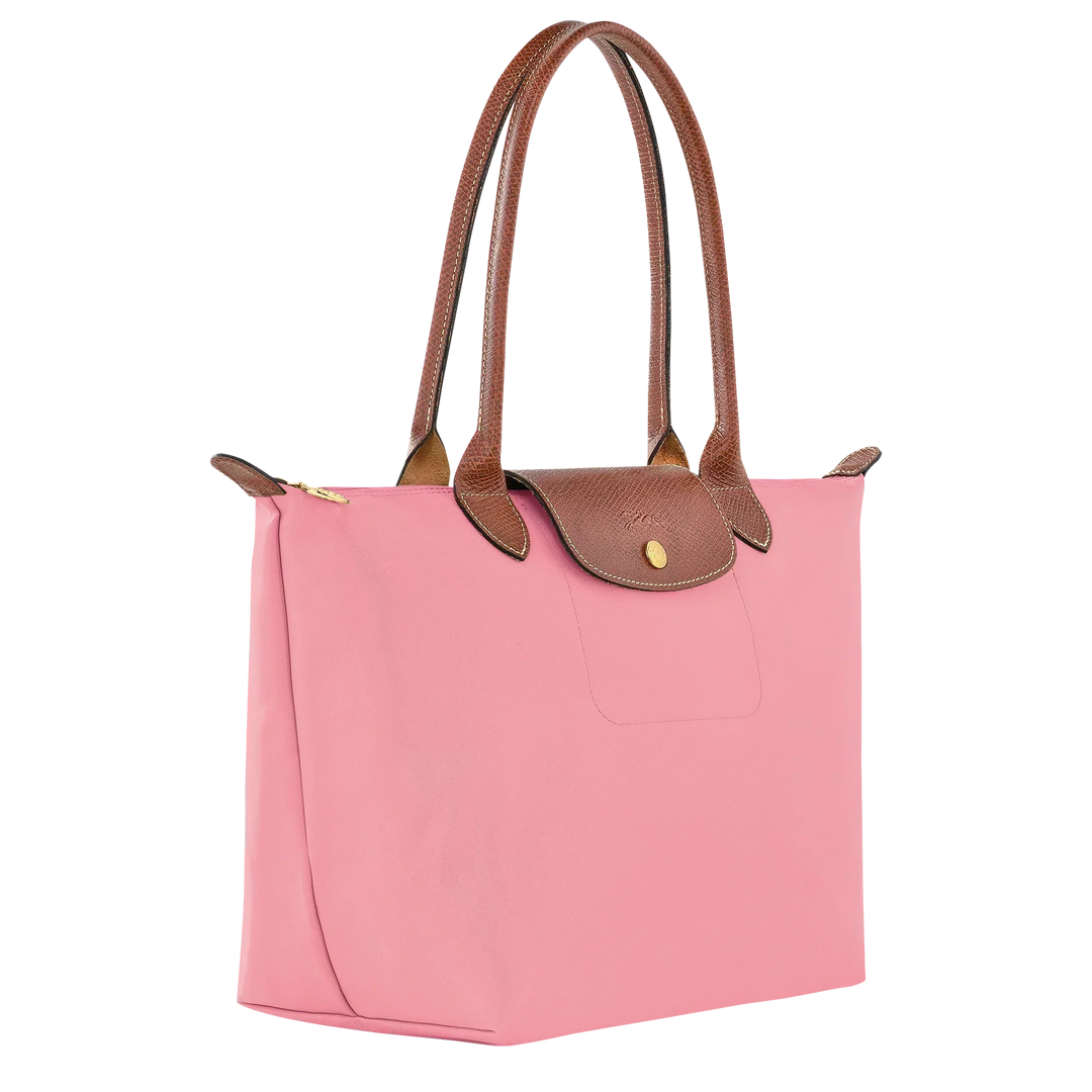 Longchamp Le Pliage medium tote, pink with brown trim, front pocket, and top handles