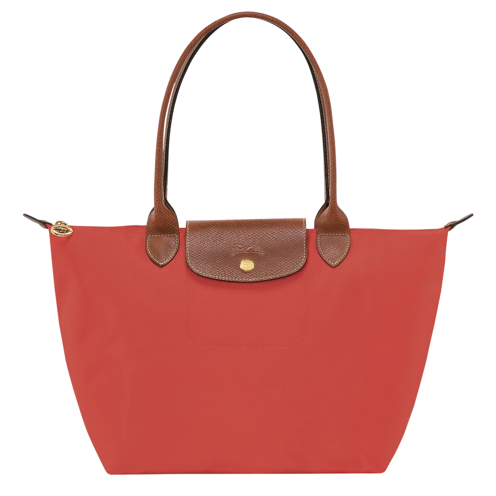 Longchamp tomato red tote with brown leather trim, front flap pocket and gold button
