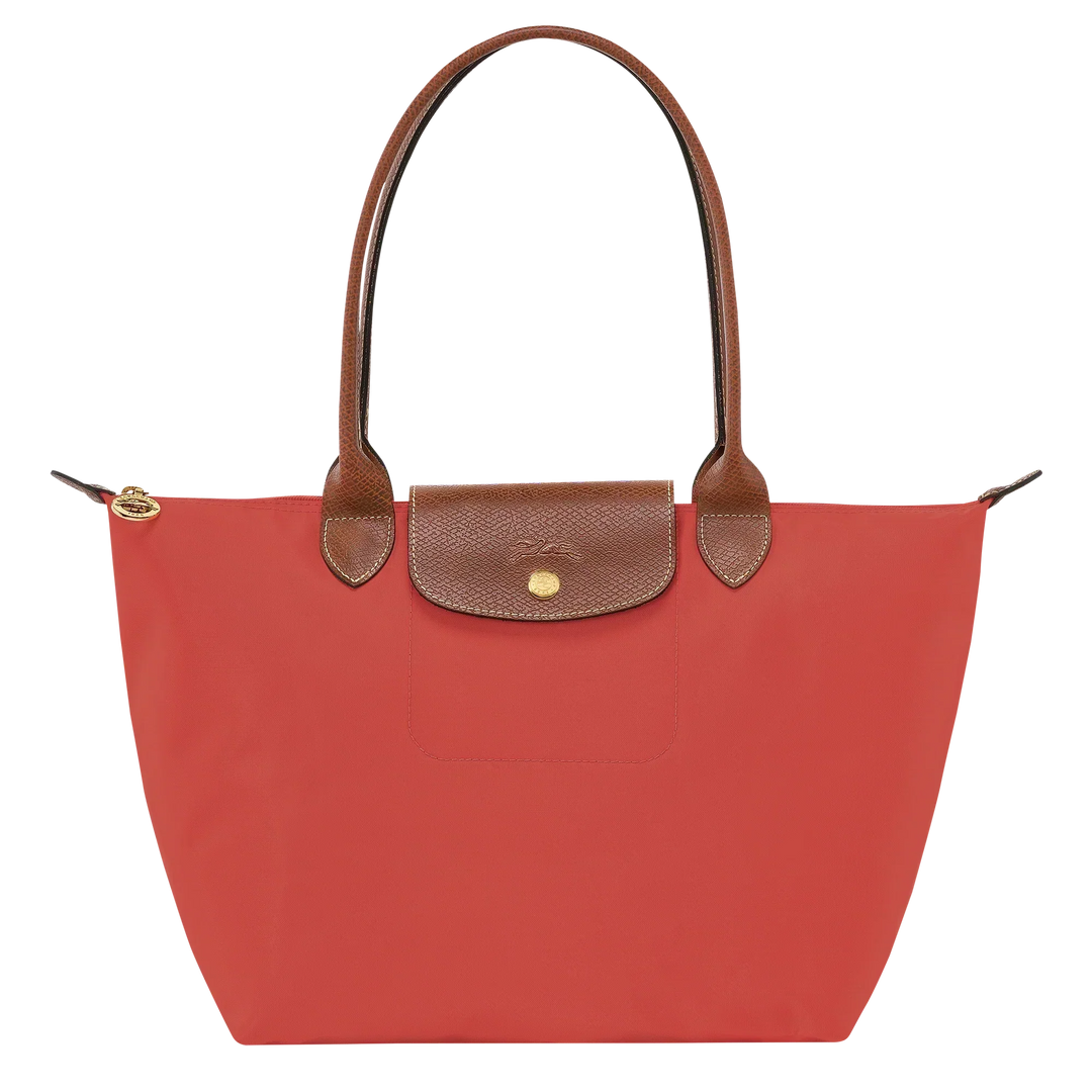 Longchamp tomato red tote with brown leather trim, front flap pocket and gold button