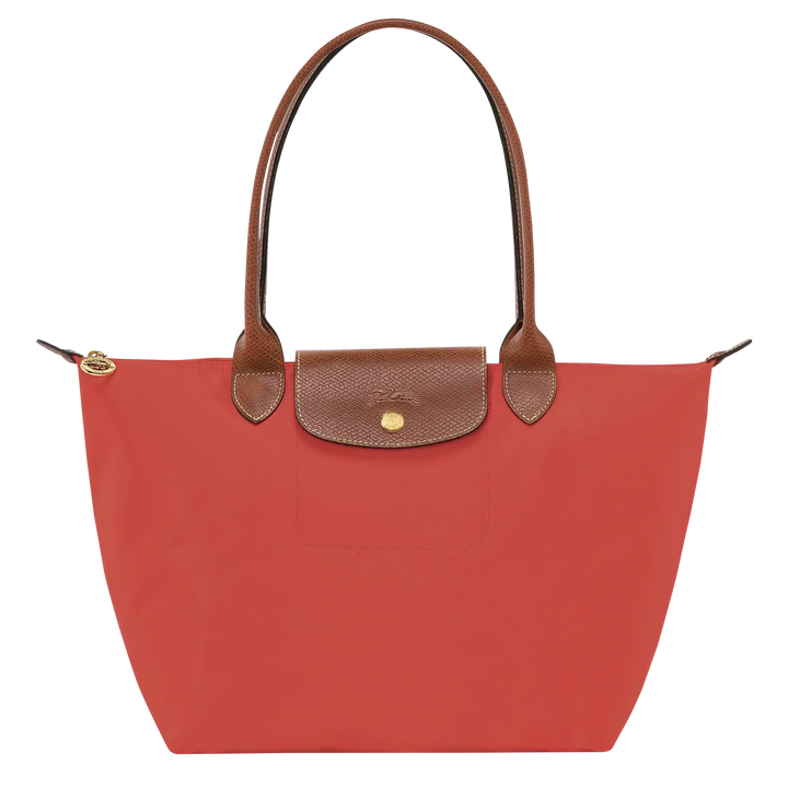 Longchamp tomato red tote with brown leather trim, front flap pocket and gold button