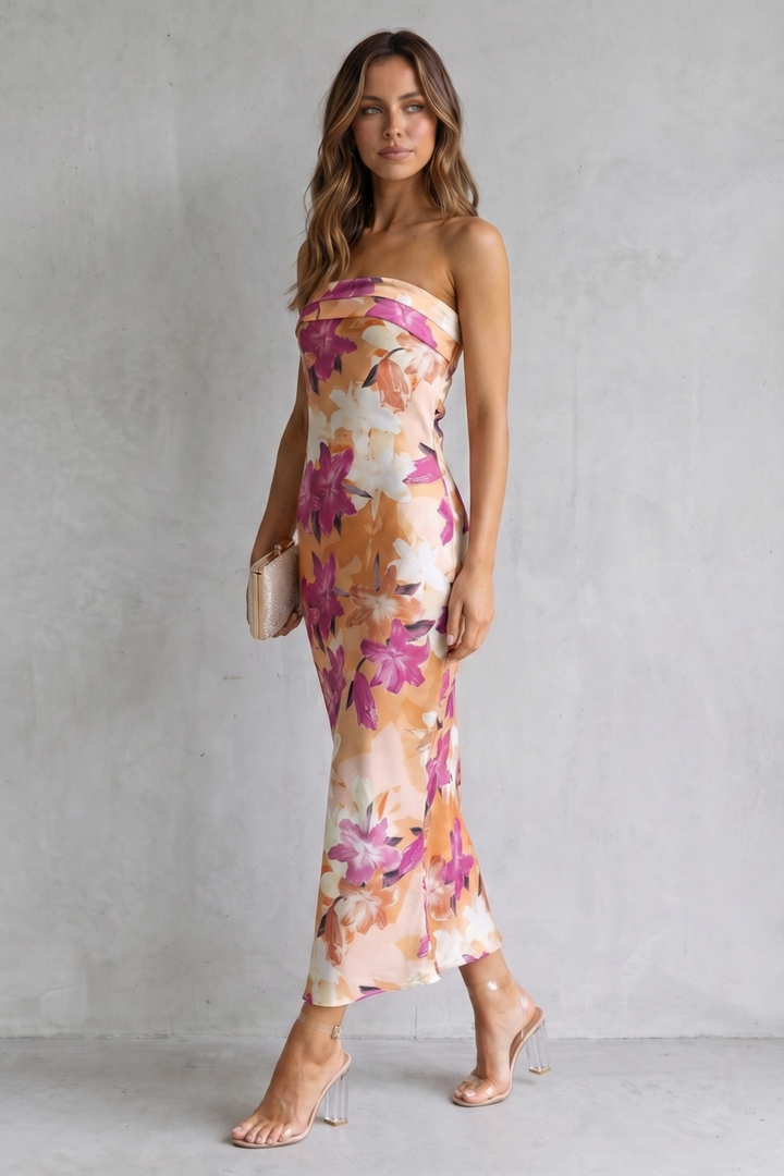 Pink strapless floral maxi dress, side view, fitted bodice and straight skirt
