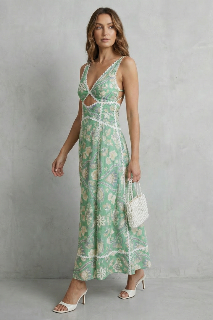Cut-out maxi dress, mint green with white floral print; openwork neckline and maxi hem