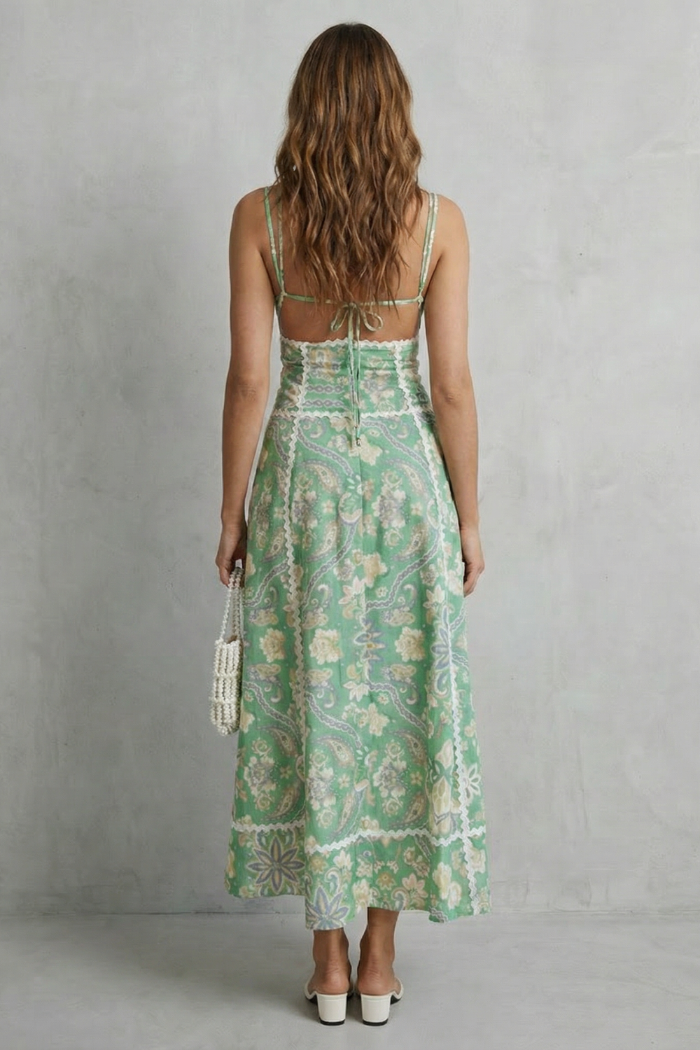 Back view cut-out maxi dress in mint green with white floral print and lace-trim straps