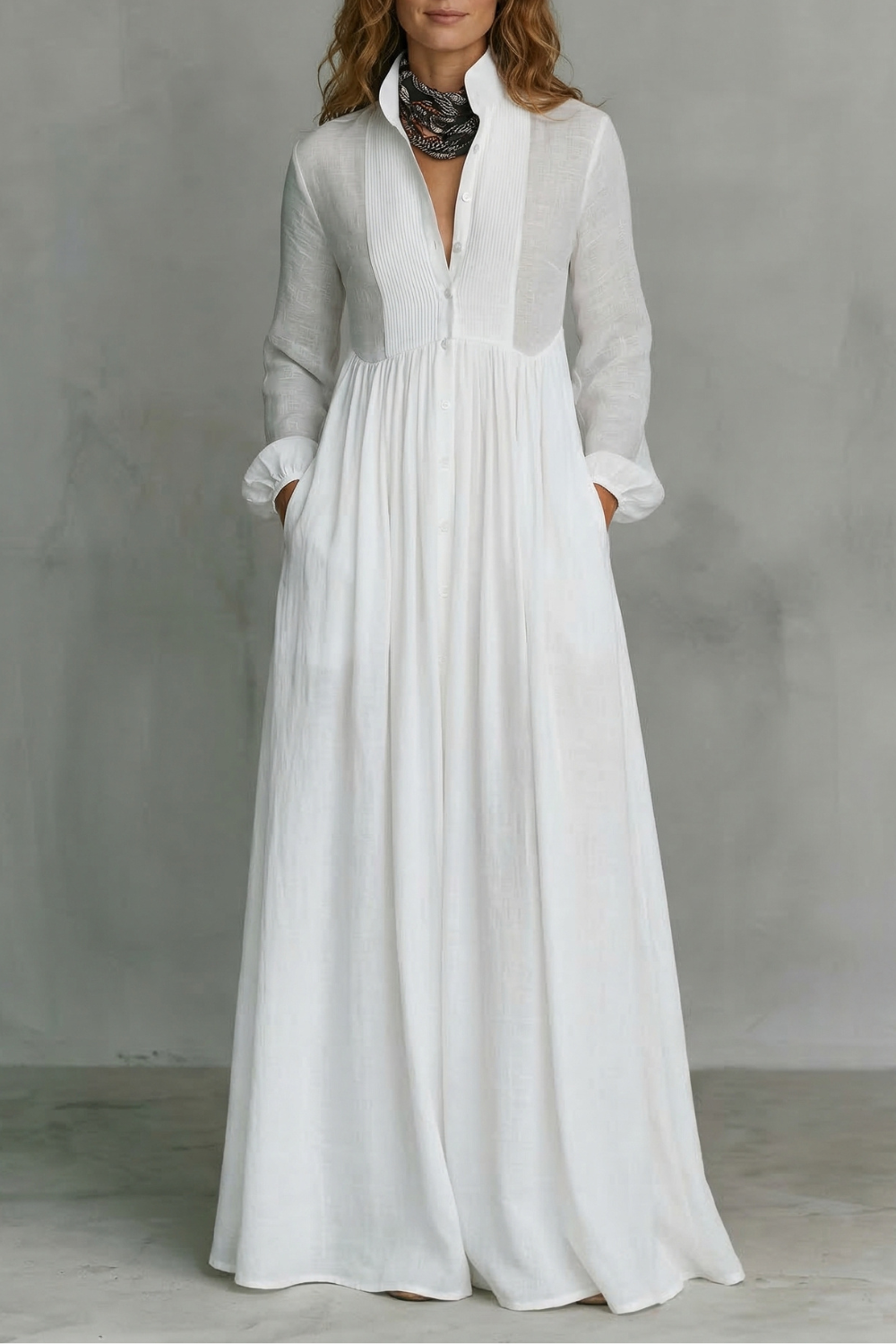 White maxi dress with mandarin collar, button-front, long sleeves, gathered skirt