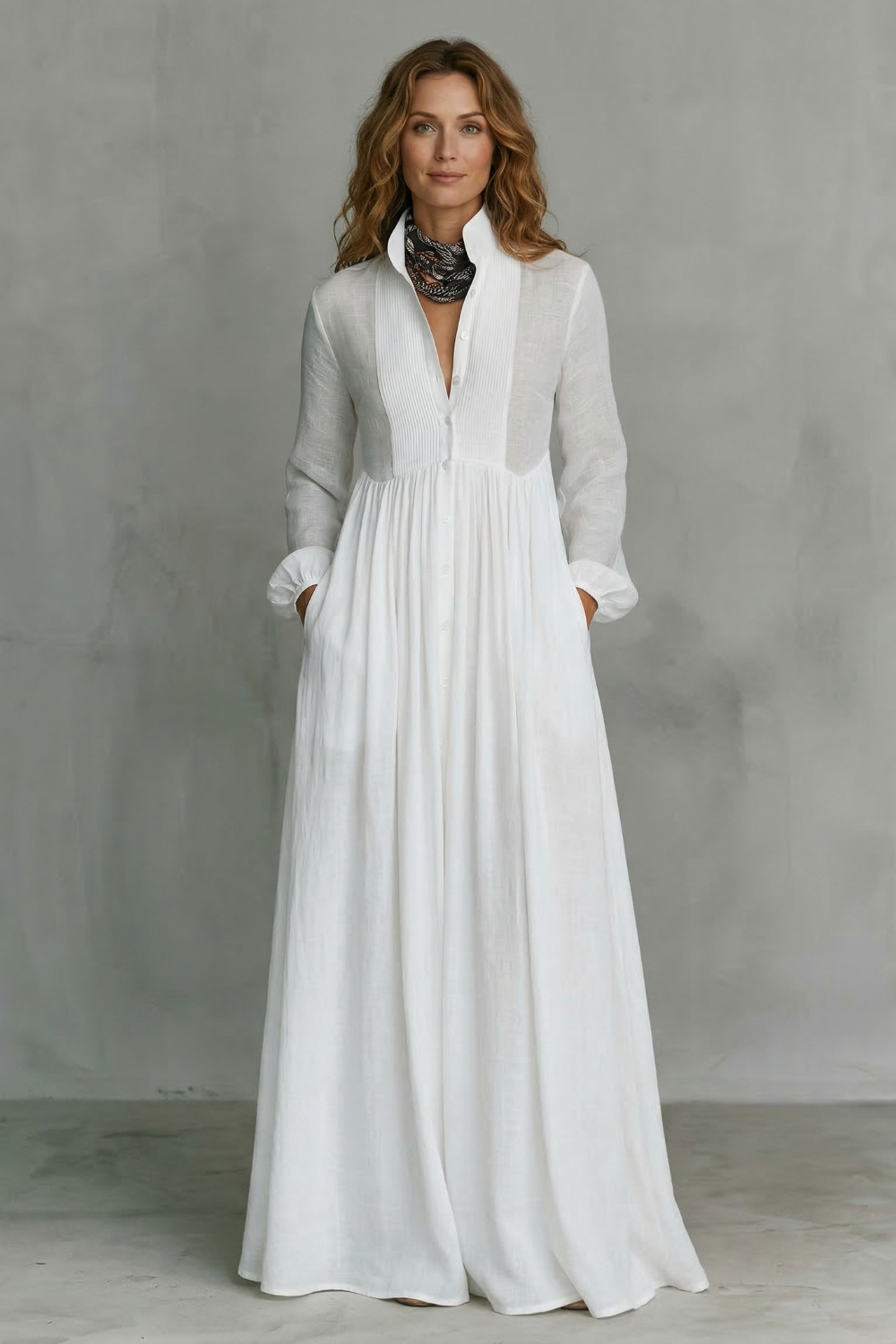 White maxi dress with mandarin collar, button-front placket, long sleeves, full skirt