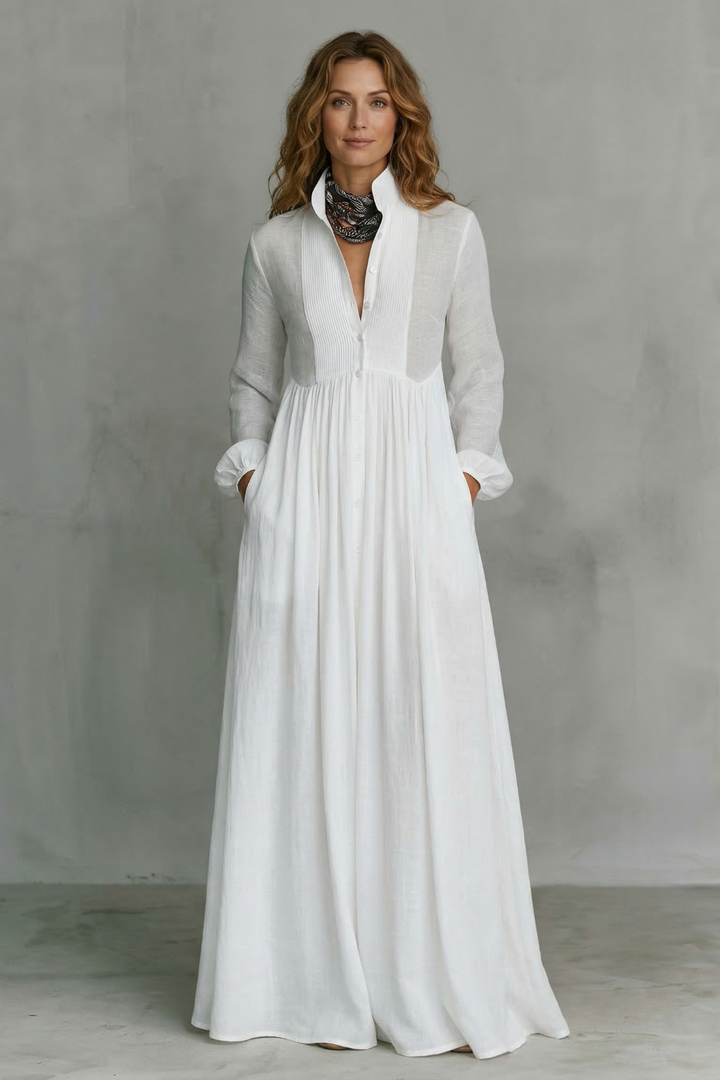 White maxi dress with mandarin collar, button-front placket, long sleeves, full skirt